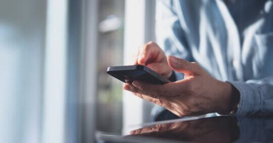 business woman using mobile smart phone, Reverse Username Search