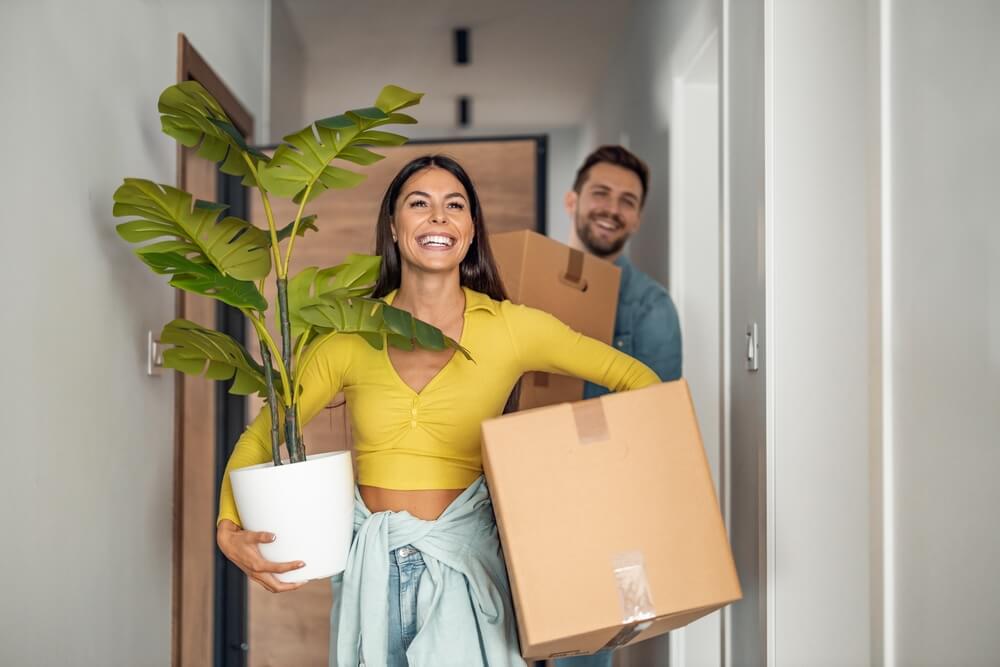 young couple moving into apartment