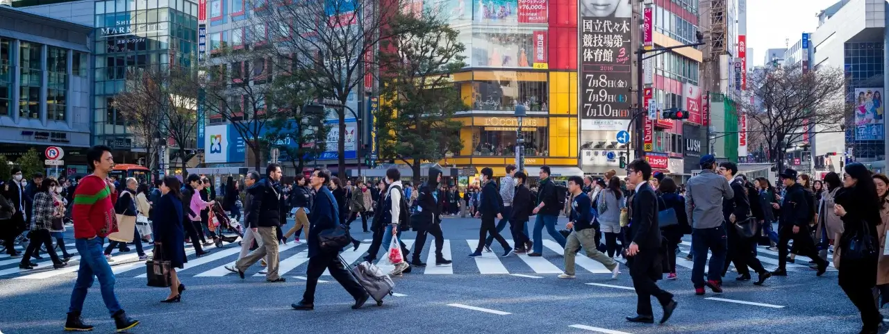 Crowd of people crossing the street