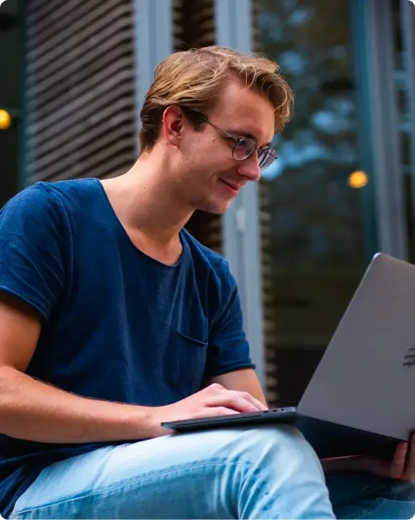 Person browsing the web on a laptop